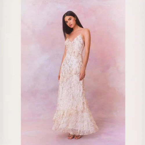 Women's lace maxi dress with shimmering appliqués and ruffle details