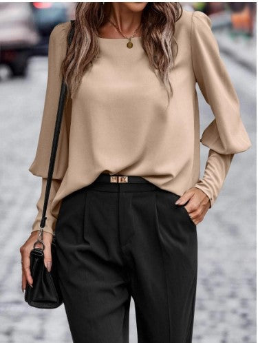 Elegant women's blouse with puff sleeve details and structured fabric Lune London