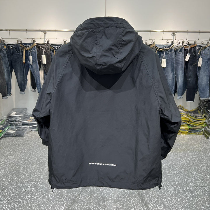 Functional outdoor jacket for men with high collar and practical pockets Lune London