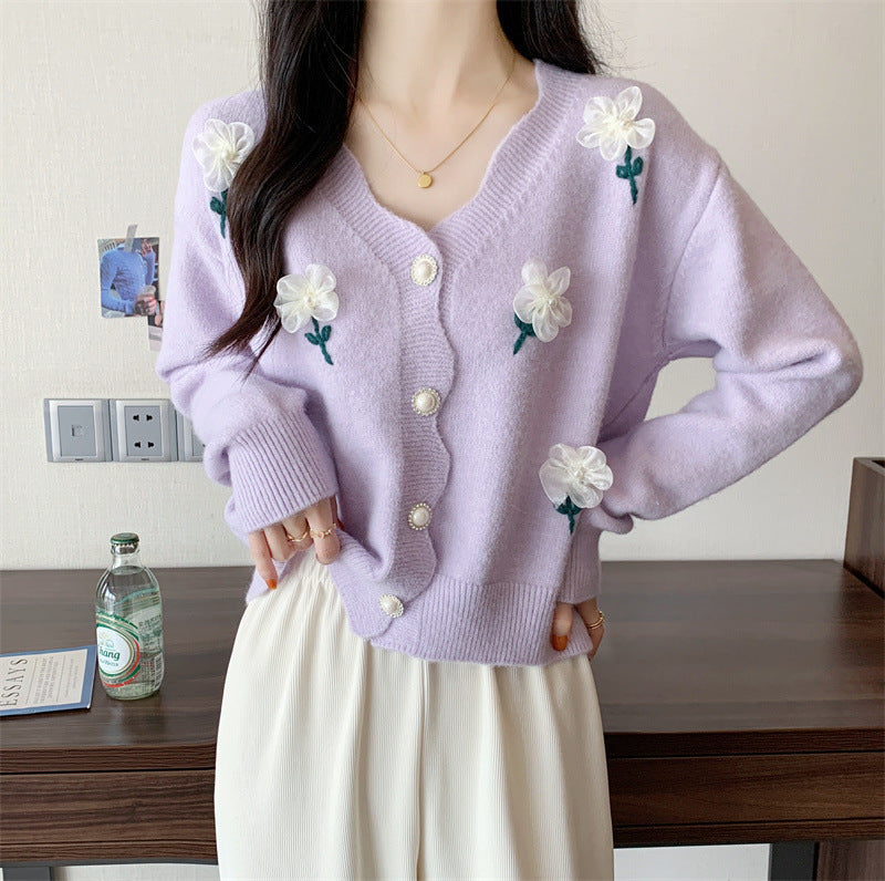 Playful women's cardigan button with floral embroidery and pearl buttons Lune London