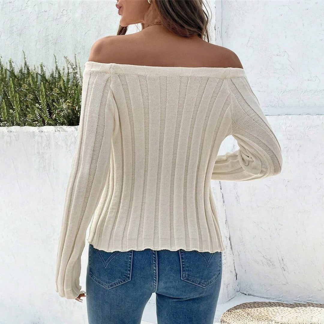 Ladies knit top with off-shoulder design and decorative buttons Lune London