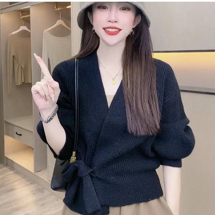 Pull ample pour femmes avec manches larges et ceinture à la taille Chic & Stil