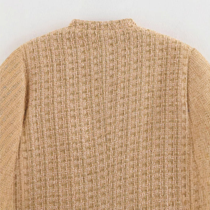 Elegant blazer jacket for women in classic style made of tweed with chic and stylish button details