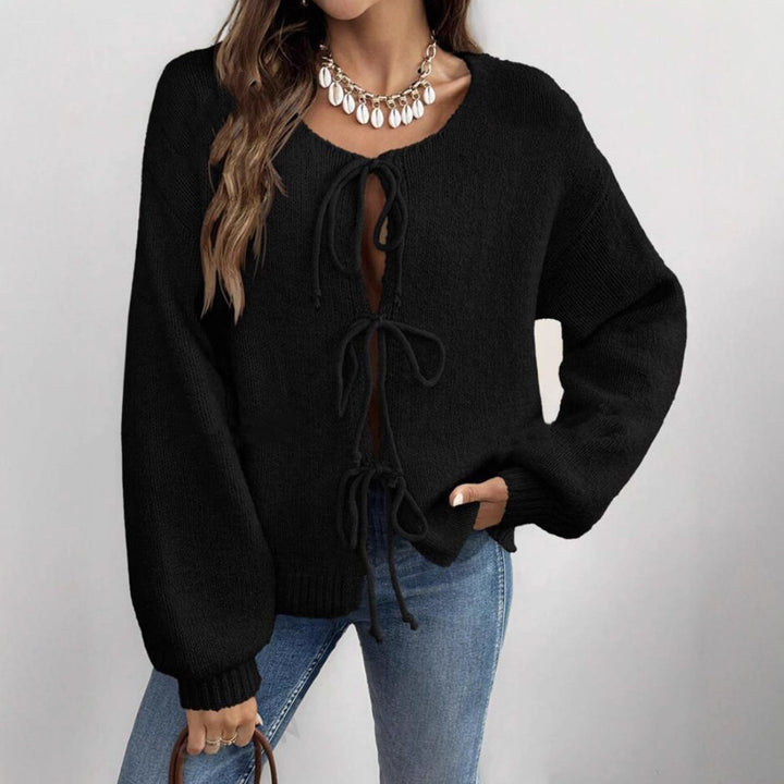 Women's knit sweater with a decorative lace-up design and casual balloon sleeves Lune London