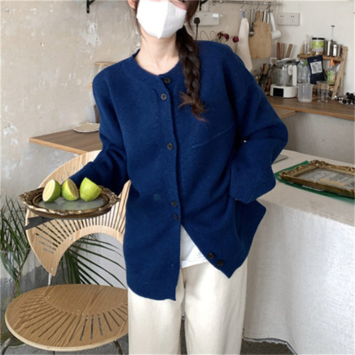 Ladies casual knitted cardigan with a fine texture and practical button details Lune London