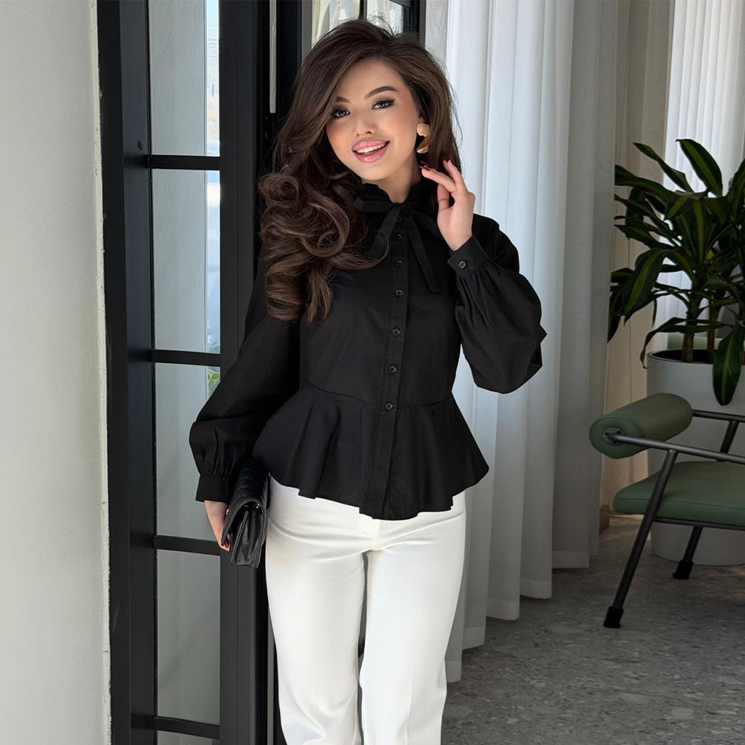 Ladies blouse with ruffle detail and flattering cut