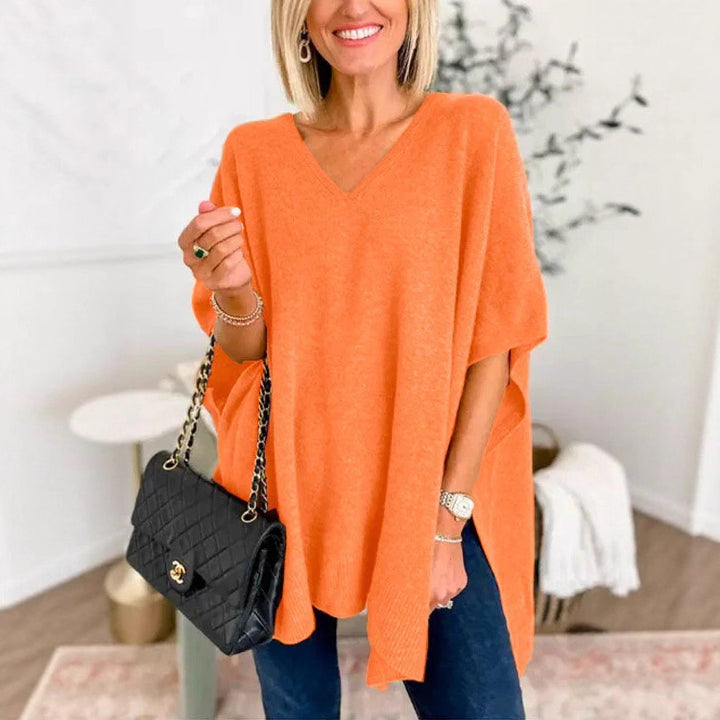 Casual knitted poncho for women with V-neck and oversized fit Lune London
