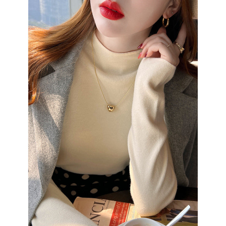 Pull-over tricoté pour femmes avec col montant et matériau doux Chic & Stil