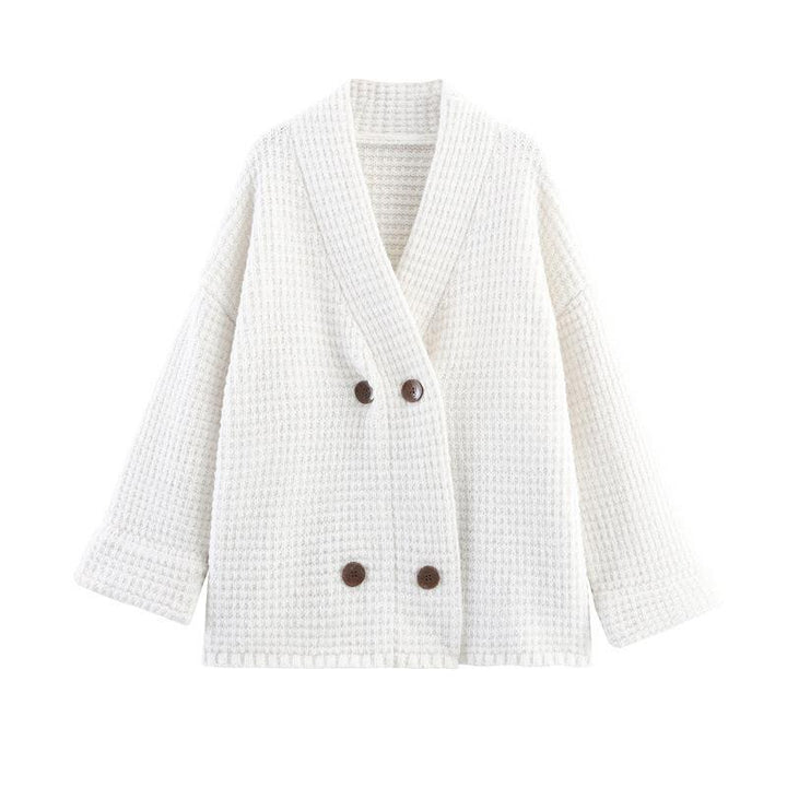 Ladies quilted knit with decorative button closure and high collar Lune London
