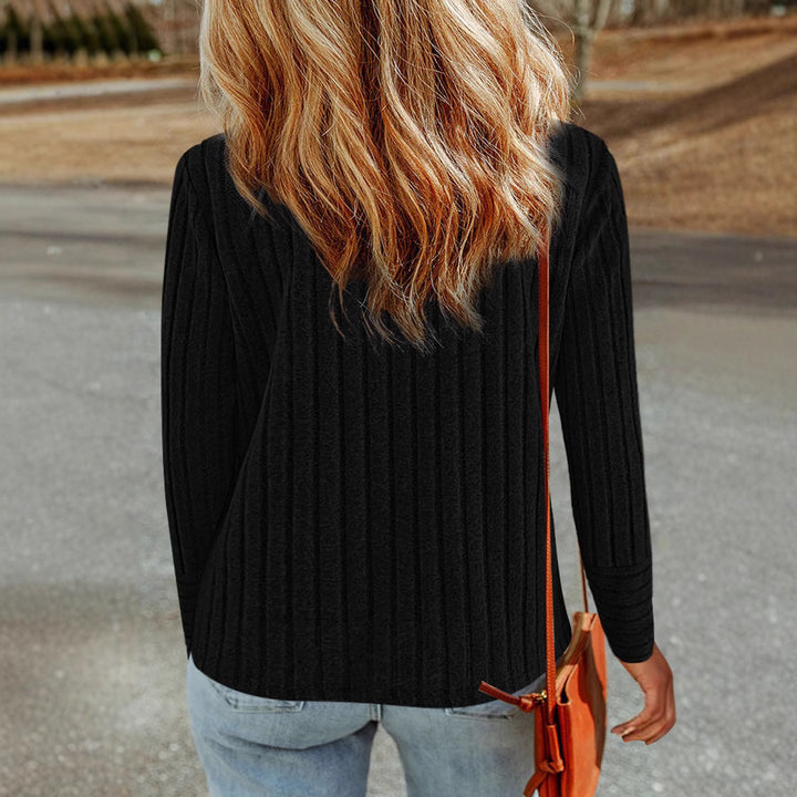 Women's stylish knit top with ribbed structure and elegant button details Lune London