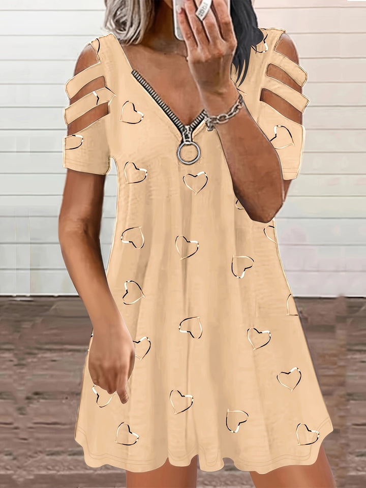 Casual dress for women with cut-out sleeves and heart pattern Lune London