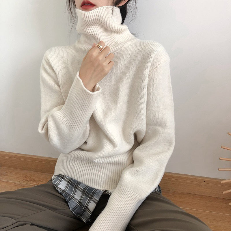 Pull à col roulé féminin à la mode en tricot doux Chic & Stil