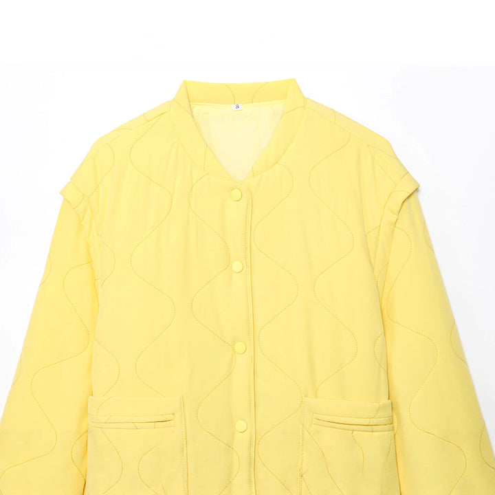 Quilted transition jacket for women with practical button closure and pockets Lune London