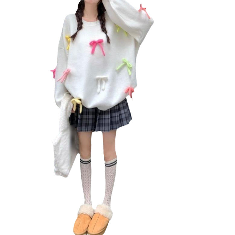 Casual sweater for women with playful bow appliqués Lune London