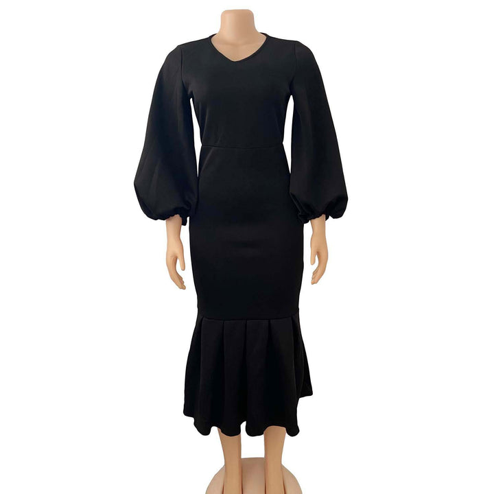 Fitted dress for women with voluminous sleeves and a flowing hem Lune London
