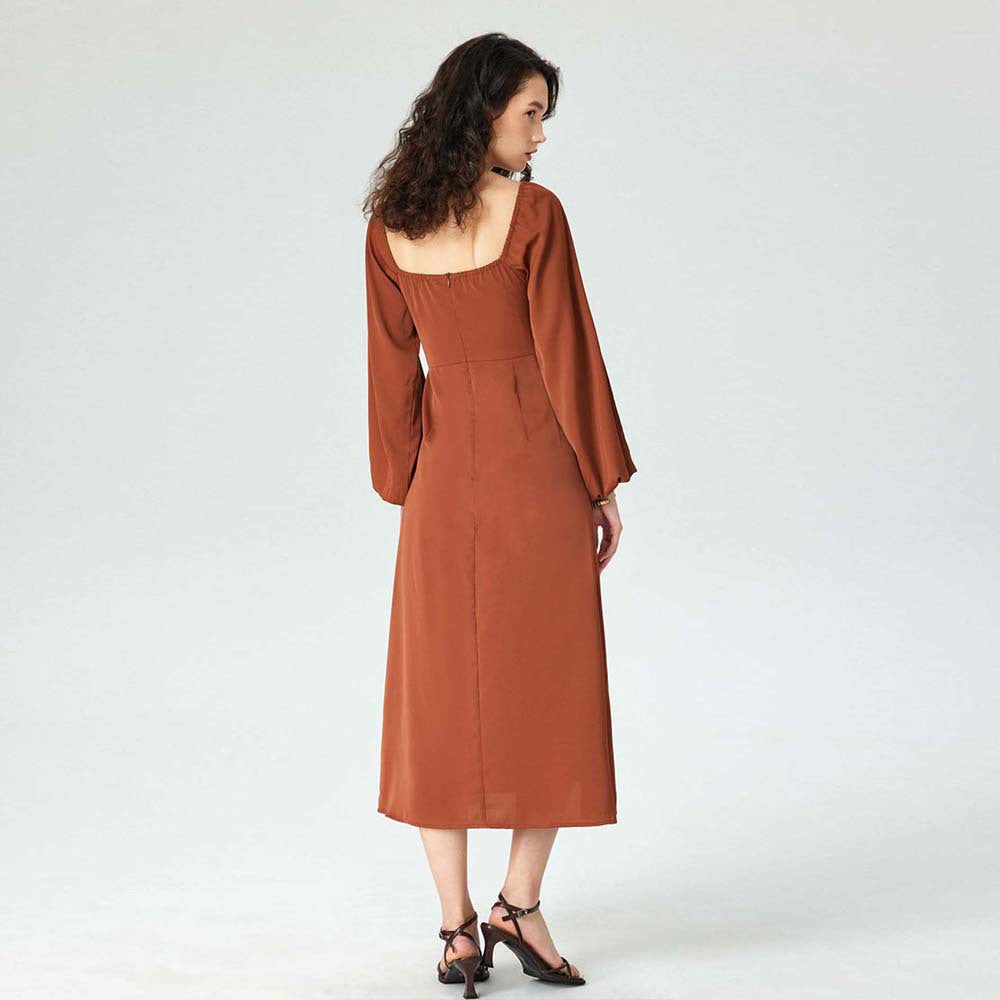 Robe midi pour femmes avec des manches bouffantes raffinées et une haute fente Chic & Stil