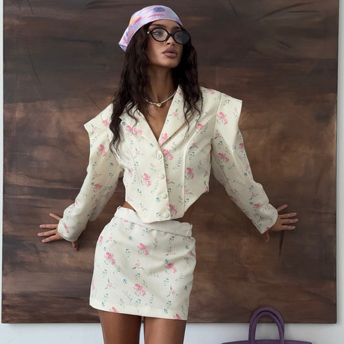 Elegant blazer set for women and mini skirt with floral pattern and puff sleeves Lune London