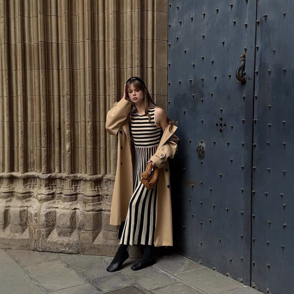 Maxi dress for women with an asymmetrical stripe pattern and elegant ruffle trim Lune London