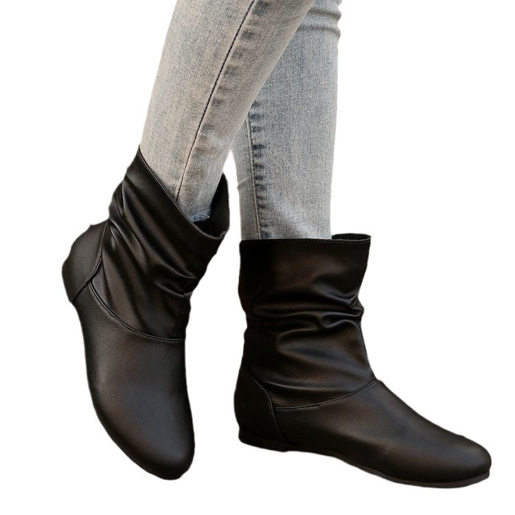 Fashionable women's ankle boots with an elegant ruffle design and a soft upper material Lune London