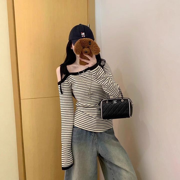 Ladies long sleeve top with off-shoulder design and fashionable stripes Chic & Stil
