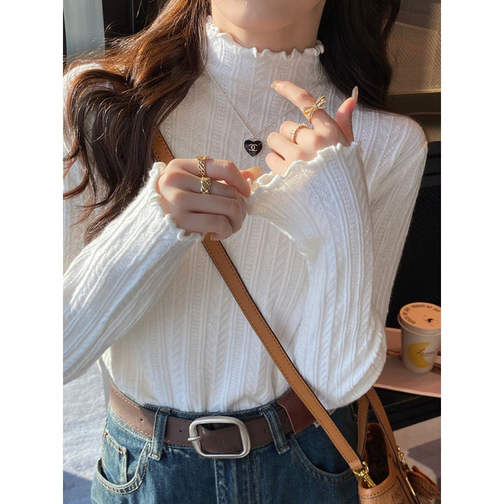 Pull femme à col roulé avec ourlet en vagues décoratif en tricot fin Chic & Stil