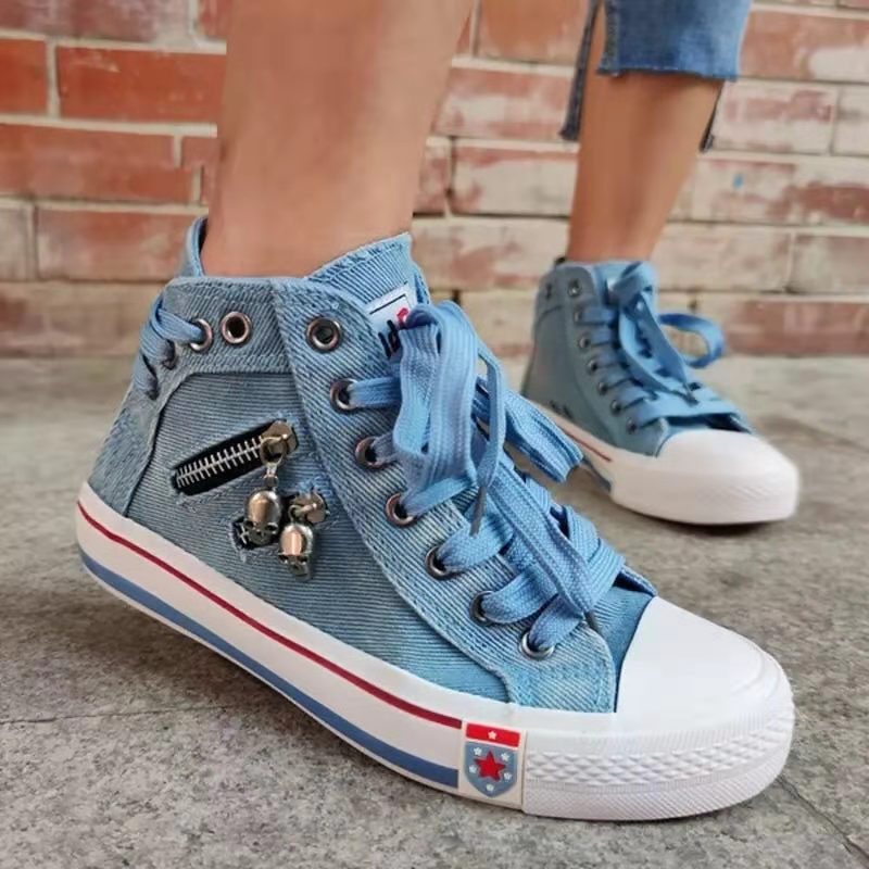 High-top sneakers for women with a modern vintage look featuring trendy zipper details Lune London
