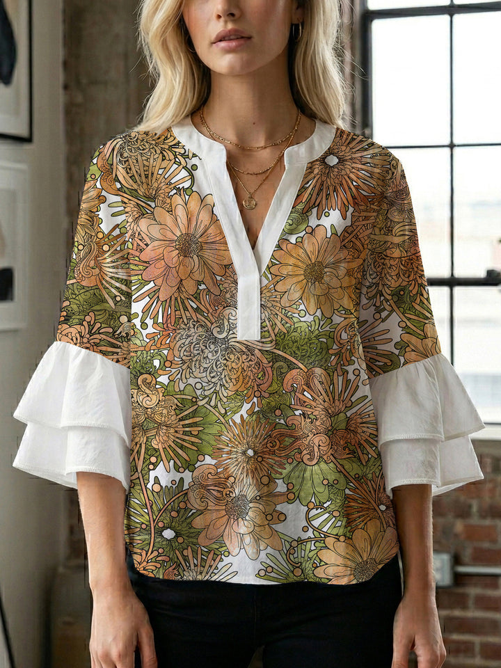 Women's blouse with voluminous ruffle sleeves and creative floral design Lune London