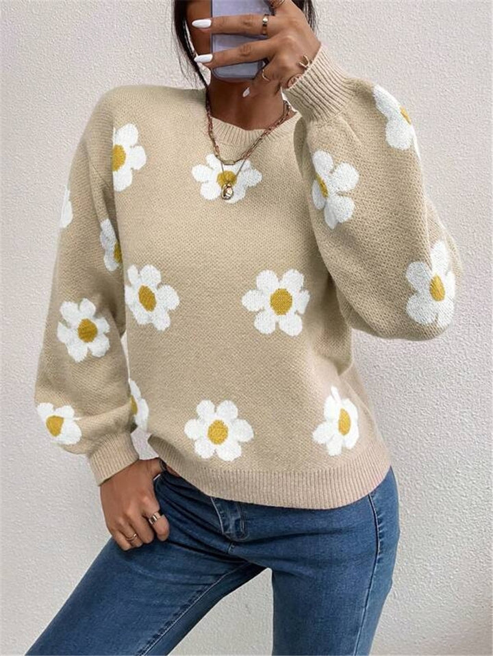 Knit sweater for women with a playful floral pattern and elegant puff sleeves Lune London