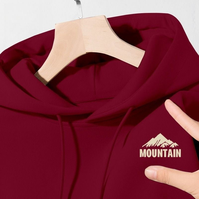 Women's hoodie with modern mountain motif and practical pockets Chic & Stil