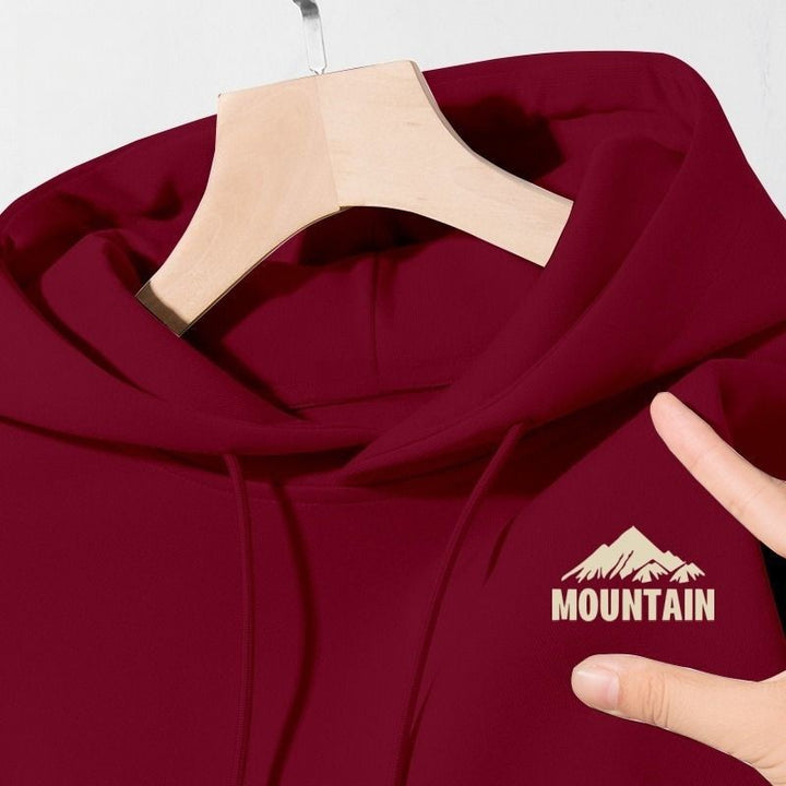 Women's hoodie with modern mountain motif and practical pockets Chic & Stil