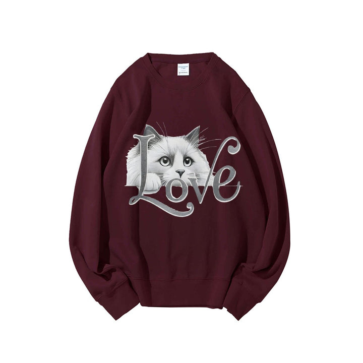 Sweat-shirt pour femmes avec un design de chat ludique et une coupe décontractée Chic & Stil