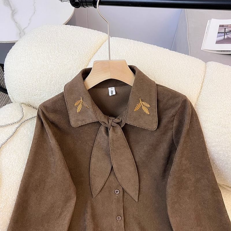 Blouse élégante pour femmes avec col en nœud Chic & Stil