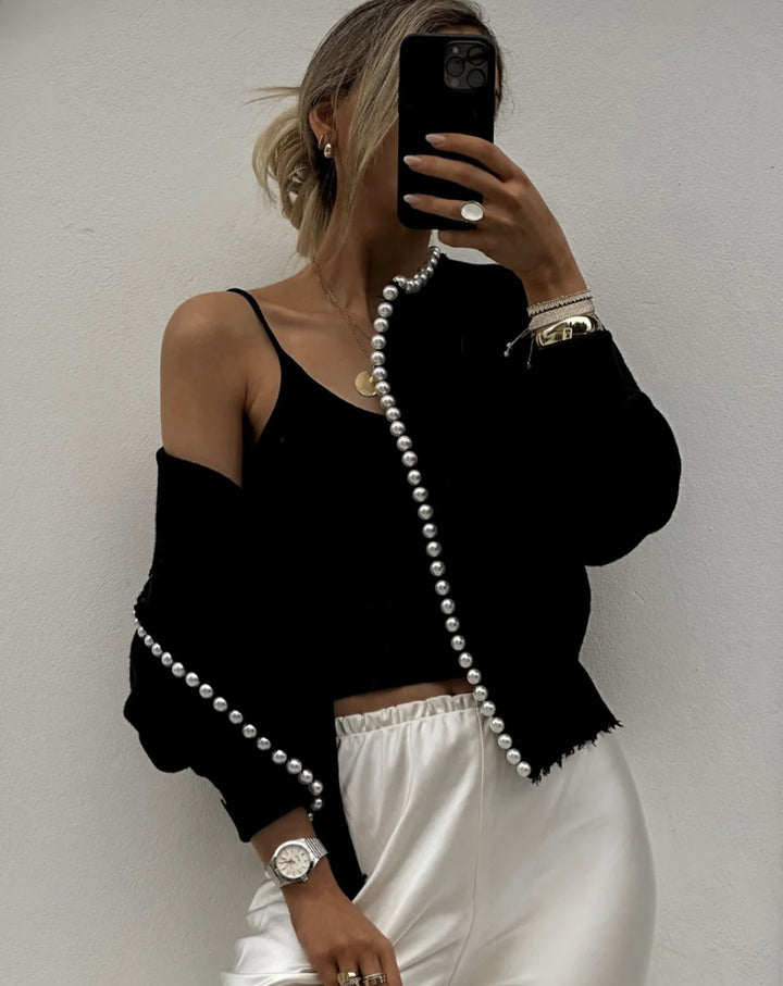 Women's knit jacket with striking bead embellishments and an open design Lune London