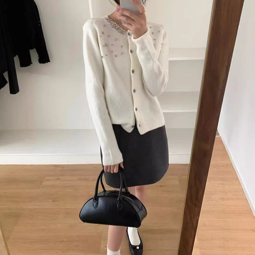 Knit jacket for women with elegant pearl appliqués and a classic round collar Lune London