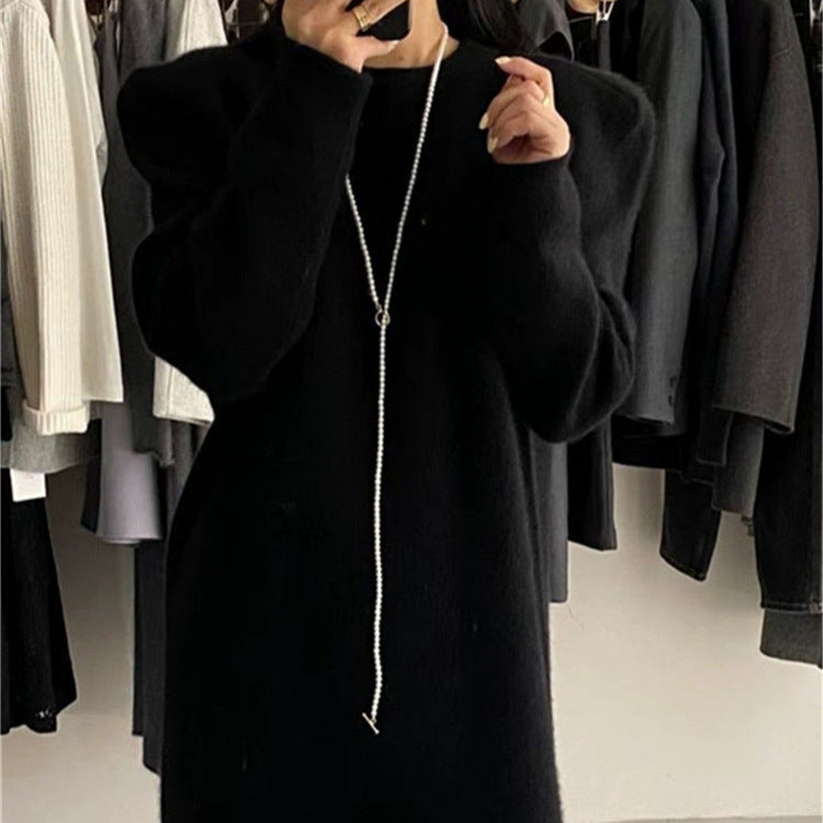 Elegant knitted dress for women with puff sleeves and a round neckline Lune London