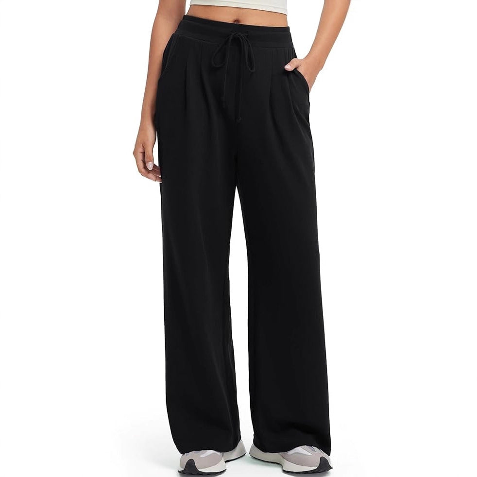 Pantalons décontractés amples pour femmes avec détails en bouton Chic & Stil