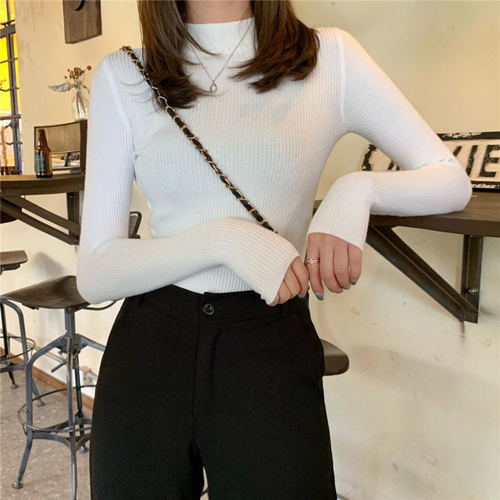 Pull à col roulé féminin à la mode en design tricot côtelé Chic & Stil