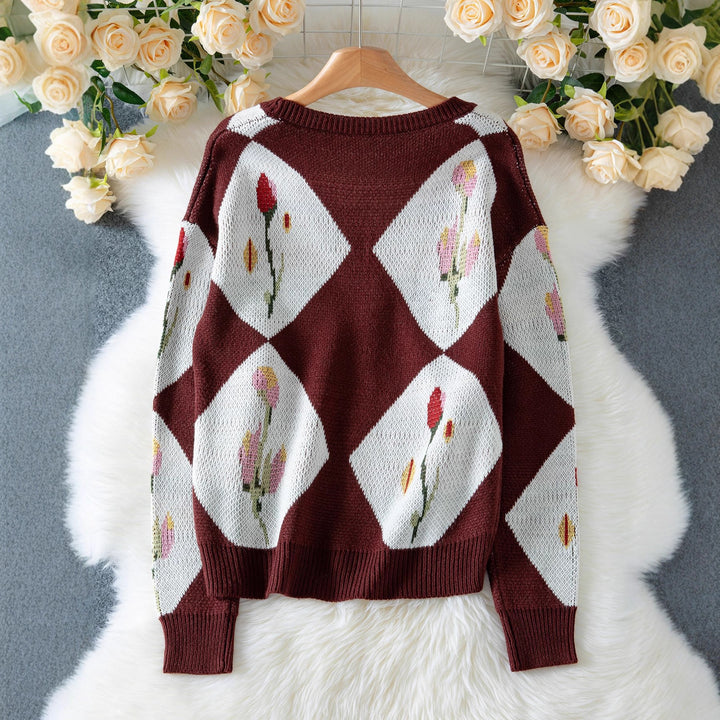 Women's knit jacket with floral pattern and decorative button design Lune London