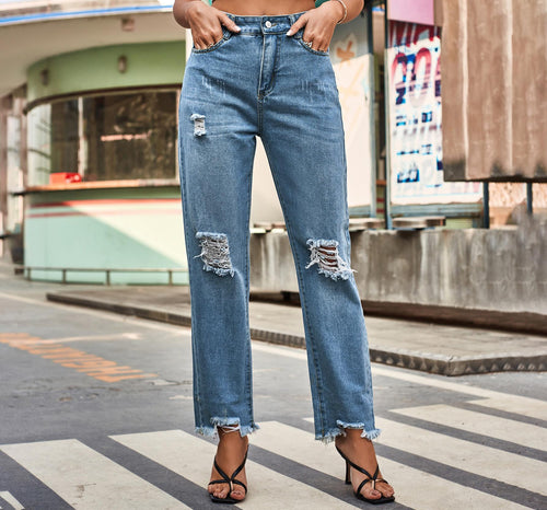 Destroyed jeans for women in a modern boyfriend cut with frayed details Lune London