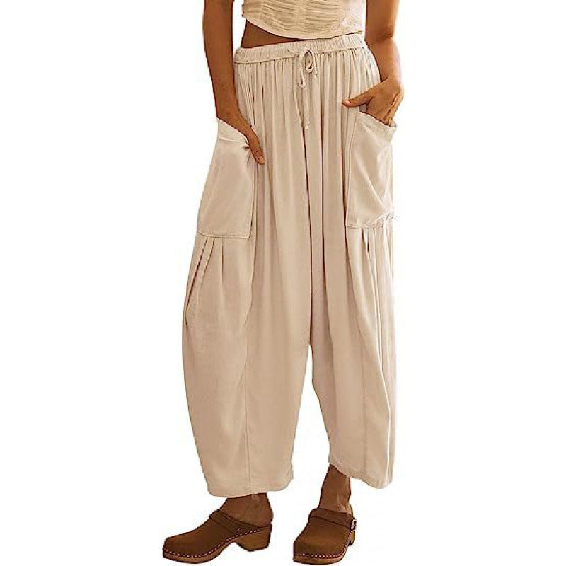 Casual harem pants for women with practical side pockets and loose fit Lune London