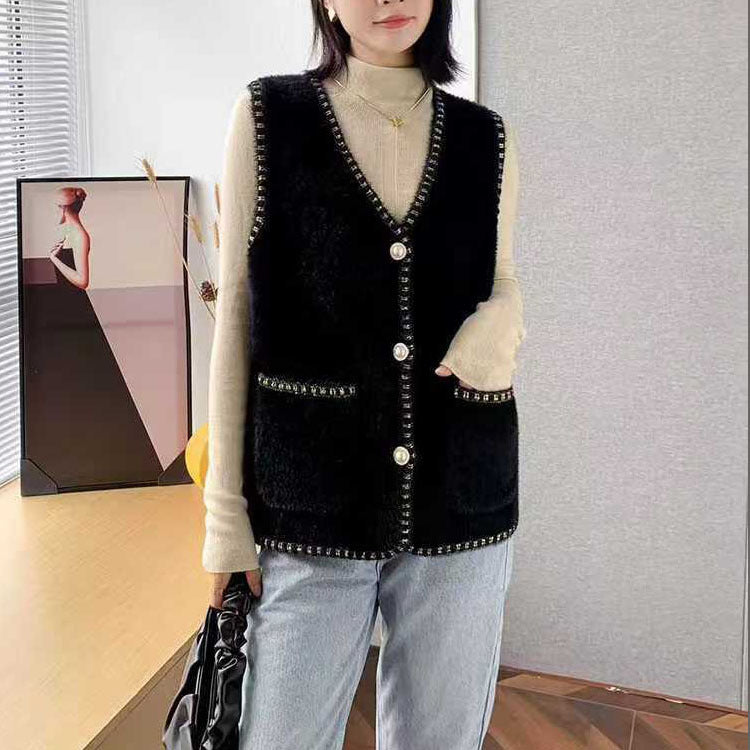 Ladies knitted vest with decorative button details Lune London