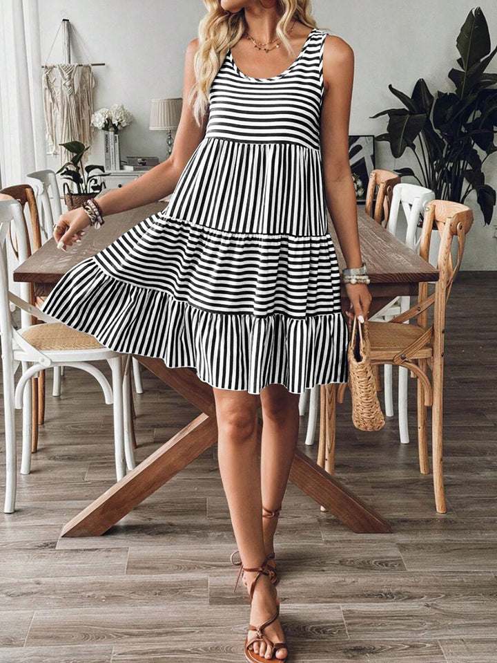 Striped summer dress for women with a voluminous ruffled hem Lune London