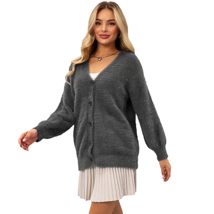 Cardigan confortable pour femmes avec coupe asymétrique et fermeture par bouton Chic & Stil