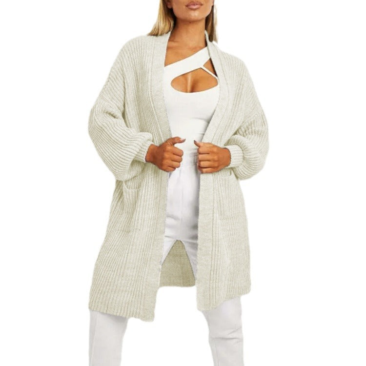 Thick knitted cardigan for women with a loose fit and practical pockets Lune London