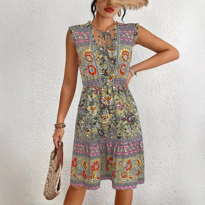 Summer midi dress for women with a playful floral pattern and a relaxed fit Lune London