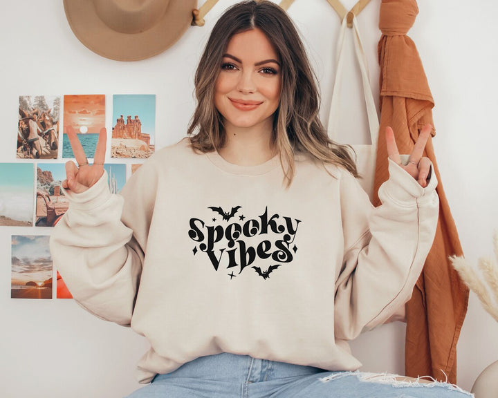 Sweat à capuche pour femmes avec un design Halloween ludique et une coupe confortable Chic & Stil