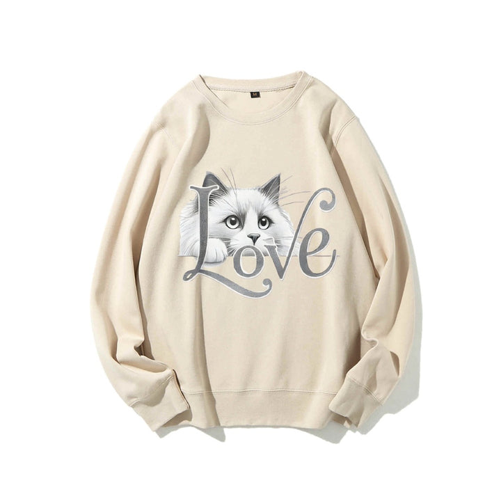 Sweat-shirt pour femmes avec un design de chat ludique et une coupe décontractée Chic & Stil