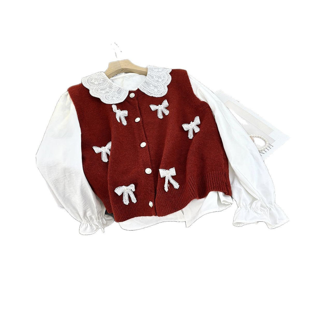 Ladies playful knit cardigan with rolled collar and decorative bows Lune London