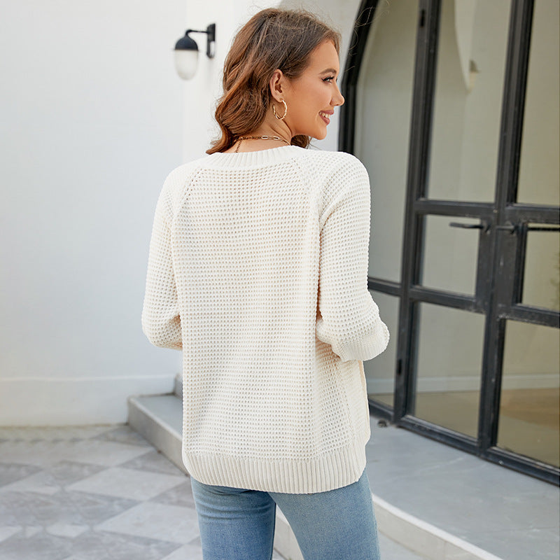 Women's knitted jacket with a modern textured pattern and practical zippered pockets Lune London