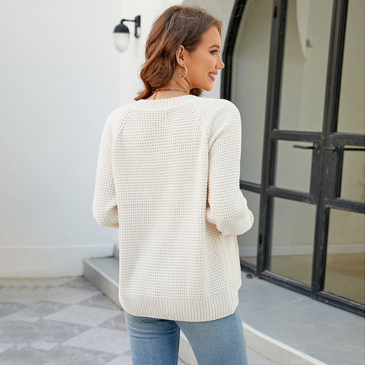 Women's knitted jacket with a modern textured pattern and practical zippered pockets Lune London